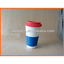 Haonai KC-00937 ceramic mug with silicone lid and sleeve